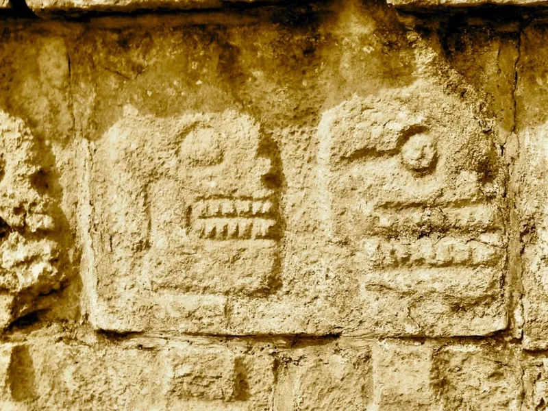 Carved skulls on the Tzompantli platform at Chichén Itzá
